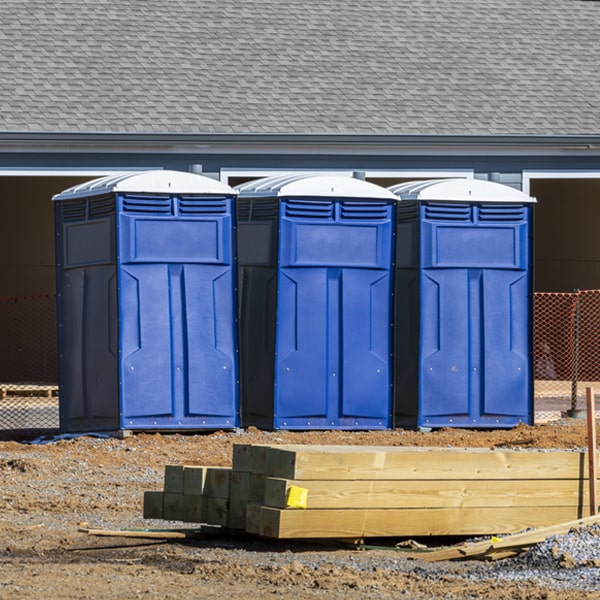 what is the cost difference between standard and deluxe portable restroom rentals in Brooklyn